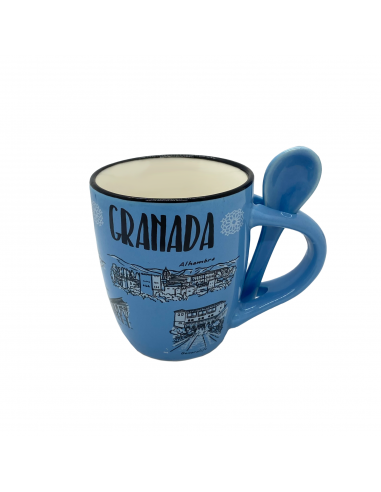 Taza de café con cuchara azul